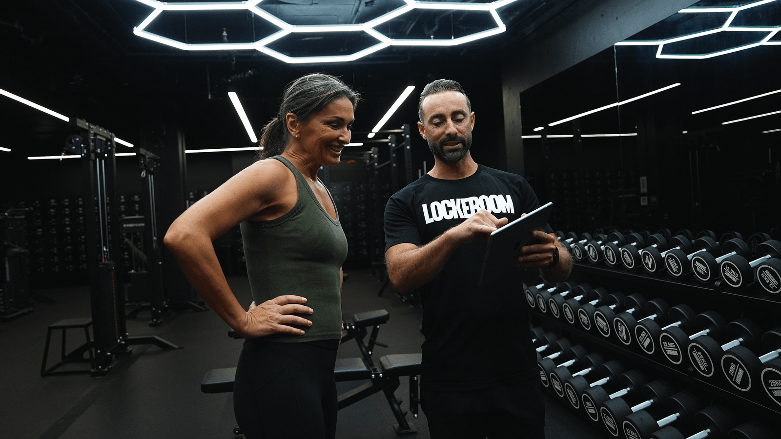 Coach testing an athlete on a Plyomat mat with iPad